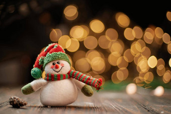 玩具雪人背景圣诞节灯