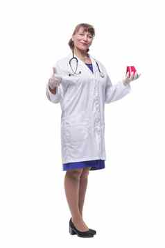女科学研究员保护手套持有烧杯红色的液体解决方案药店微生物学实验室