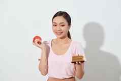 肖像华丽的年轻的亚洲女人食物选择