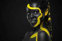 黄色的黑色的身体油漆女人脸艺术年轻的女孩bodypaint令人惊异的模型化妆