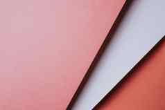 摘要粉红色的橙色白色黄色的颜色纸几何作文背景形状极简主义阴影复制空间最小的几何形状色彩斑斓的背景概念