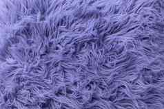 紫色的软皮毛背景纹理毛茸茸的蓝色的皮毛毯子颜色仙女平躺前视图复制空间