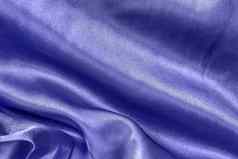 颜色一年光滑的紫罗兰色的蓝色的丝绸缎折叠特写镜头布纹理背景摘要壁纸