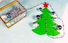 银饰品玻璃黄金棺材装修平圣诞节树黑色的蓝色的背景