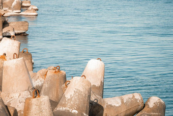 海岸防波堤保护大波海水背景海滨钢筋混凝土四足动物