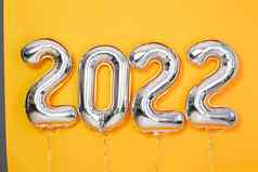 箔气球数字一年庆祝活动装饰设计元素黄色的背景