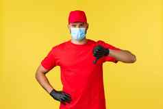 表达交付流感大流行科维德安全航运在线购物概念不高兴快递红色的统一的医疗面具手套显示贬低不喜欢