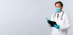 科维德防止病毒医疗保健工人疫苗接种概念专业医生医疗面具手套持有剪贴板写作病人症状战斗冠状病毒诊所