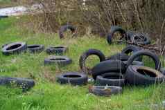 环境污染概念生态问题轮胎车轮子分散草