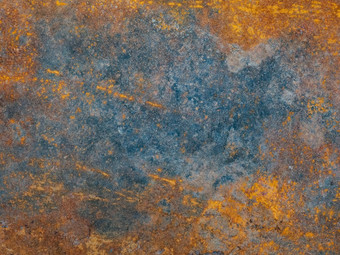 金属板饱经风霜的颜色生锈自然光蓝色的橙色金属板氧化色彩斑斓的变形表面摘要难看的东西生锈的金属背景多个腐蚀图片