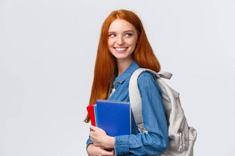 女孩同学大厅把回来问候微笑快乐持有背包笔记本电脑标题回来类研究大学站白色背景