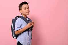 一边肖像小学生学校袋回来粉红色的背景复制空间回来学校概念