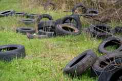 环境污染概念生态问题轮胎车轮子分散草