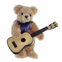 可爱的棕色（的）泰迪熊玩吉他