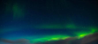 北部灯极光北欧化工极<strong>地灯</strong>冷晚上深黑色的明星天空美丽的晚上照片魔法自然现象