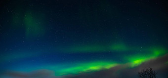 北部灯极光北欧化工极<strong>地灯</strong>冷晚上深黑色的明星天空美丽的晚上照片魔法自然现象