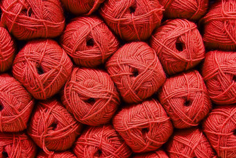 红色的球羊毛美丽的彩色的毛球羊毛纹理<strong>棉衣</strong>,纱自然材料针织有创意的的想法摘要Diy背景