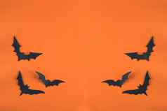 万圣节概念纸装饰蝙蝠减少黑色的纸橙色背景纸减少风格前视图复制空间