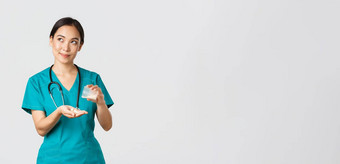 医疗保健工人防止病毒检疫运动概念深思熟虑的有爱心的微笑亚洲女护士实习生实习医生风云处理药物治疗病人梦幻上左角落里
