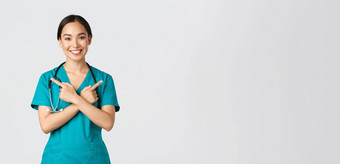 科维德医疗保健工人流感大流行概念微笑美丽的亚洲护士实习生医生实习医生风云指出横盘整理相机显示变体选择白色背景