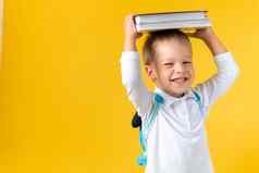 横幅有趣的学前教育孩子男孩年书头袋黄色的背景复制空间快乐微笑孩子回来学校幼儿园成功动机天才超级英雄概念