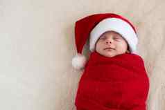 前视图肖像天生活新生儿可爱的有趣的睡觉婴儿圣诞老人他包装红色的尿布白色加兰背景快乐圣诞节快乐一年婴儿童年冬天复制空间