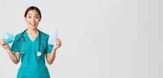 科维德冠状病毒疾病医疗保健工人概念逗乐微笑亚洲女护士埋葬实习医生风云显示呼吸器医疗面具收到个人保护设备