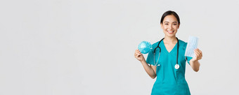 科维德冠状病毒疾病医疗保健工人概念愉快的女医生亚洲医生实习医生风云显示呼吸器医疗面具提供工作人员个人保护设备