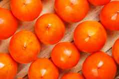 新鲜的成熟的柿子市场柿子背景