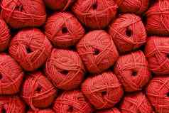 红色的球羊毛美丽的彩色的毛球羊毛纹理棉衣,纱自然材料针织有创意的的想法摘要Diy背景