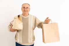 养老金领取者上了年纪的退休男人。持有包