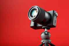 相机三脚架红色的背景专业视频拍摄摄影博客报道
