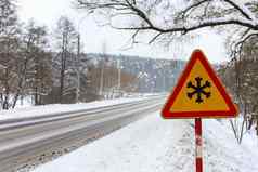 临时路迹象路冬天交通警告标志显示危险冰雪街高速公路路冬天开车风险雪冰