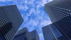 玻璃建筑多云的蓝色的天空背景业务概念行业科技体系结构呈现插图