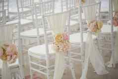 婚礼装饰花椅子婚礼退出登记白色椅子装饰婚礼婚礼设置细节