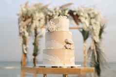 婚礼蛋糕海滩婚礼背景美丽的拱退出仪式
