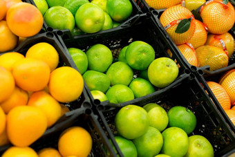 新鲜的柑橘类架子上商店各种柑橘类水果橙子橘子石灰柠檬超市