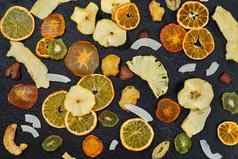 有机健康的各种各样的干水果特写镜头零食打苹果梨橙色香蕉柿子椰子菠萝草莓