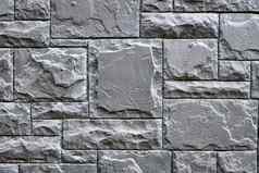 墙使灰色的花岗岩石头