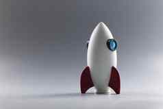 火箭玩具模型站灰色表面艘宇宙飞船象征业务项目