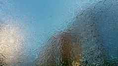 冻挡风玻璃细粒度的结构透明的冰天空闪亮的摘要冰背景