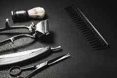 黑色的表面古董手册理发师工具