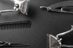 黑色的表面理发师工具古董手持头发快船库姆斯剃须刀美容剪刀剃须刷单色水平