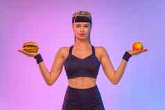 吃适合运动女人选择汉堡苹果困难选择快食物健康的食物的想法社会媒体帖子主题营养学