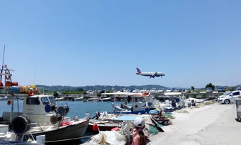 概念放松海温暖的沙子声音音乐波开始飞行空气飞机着陆机场照片视图着陆飞机背景海港