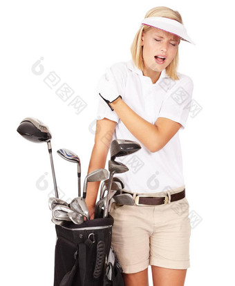 shouldve更容易回复工作室拍摄女高尔夫球手<strong>摩擦</strong>受伤的肩膀孤立的白色
