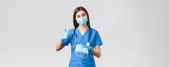 科维德防止病毒健康医疗保健工人检疫概念专业女护士医生蓝色的实习医生风云个人保护设备推荐医疗面具