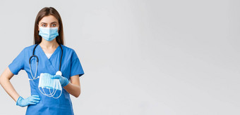 科维德防止病毒健康医疗保健工人检疫概念年轻的医生女护士蓝色的实习医生风云保护设备冠状病毒感染给医疗面具
