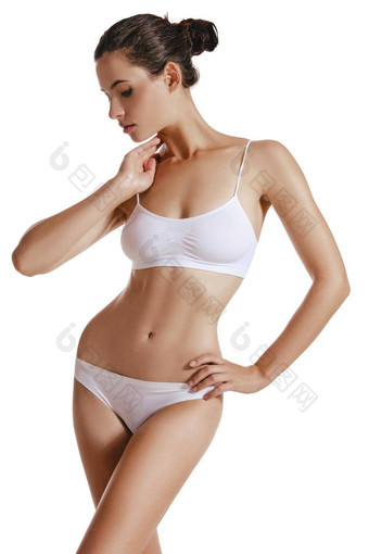 年轻的女人白色内衣捆绑头发手臀部摆姿势孤立的白色塑料手术审美美容特写镜头拍摄