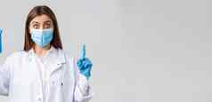 科维德防止病毒医疗保健工人检疫概念兴奋医生护士医疗面具实习医生风云手套指出手指尤里卡显示冠状病毒疫苗